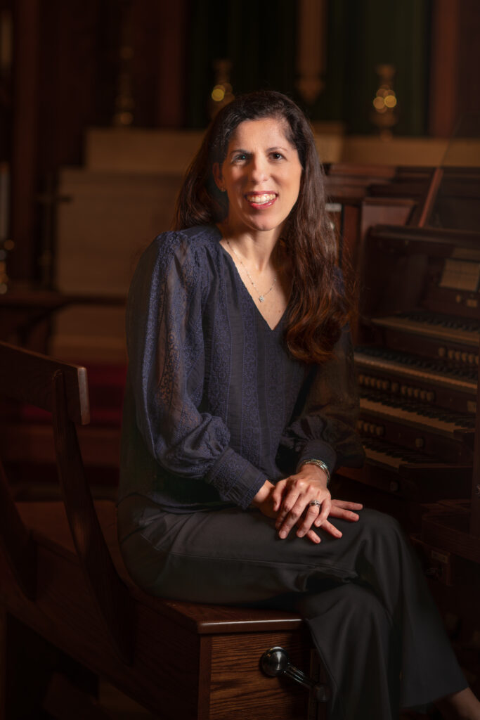 organist posing indoor church