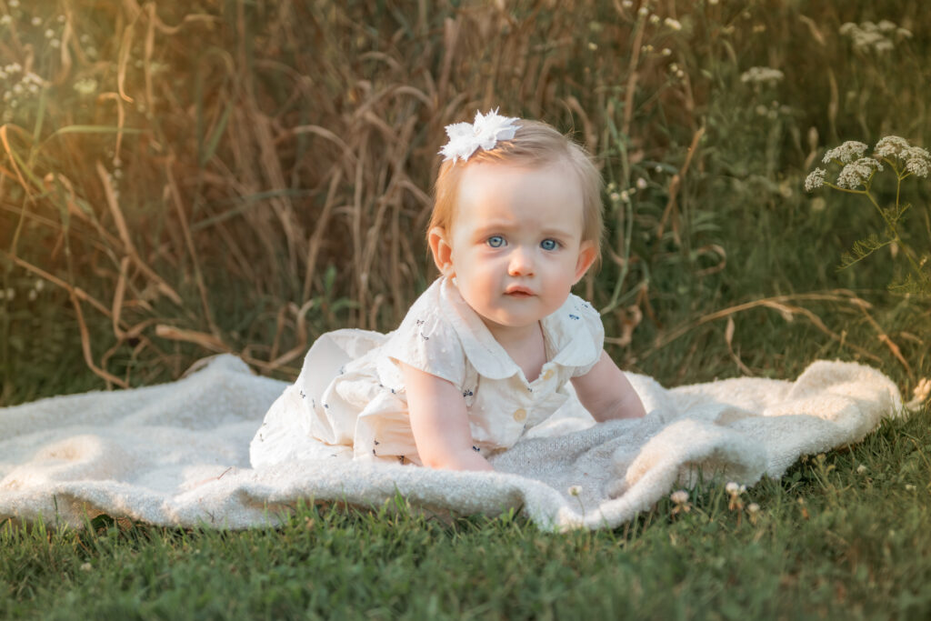 baby outdoors for family picture