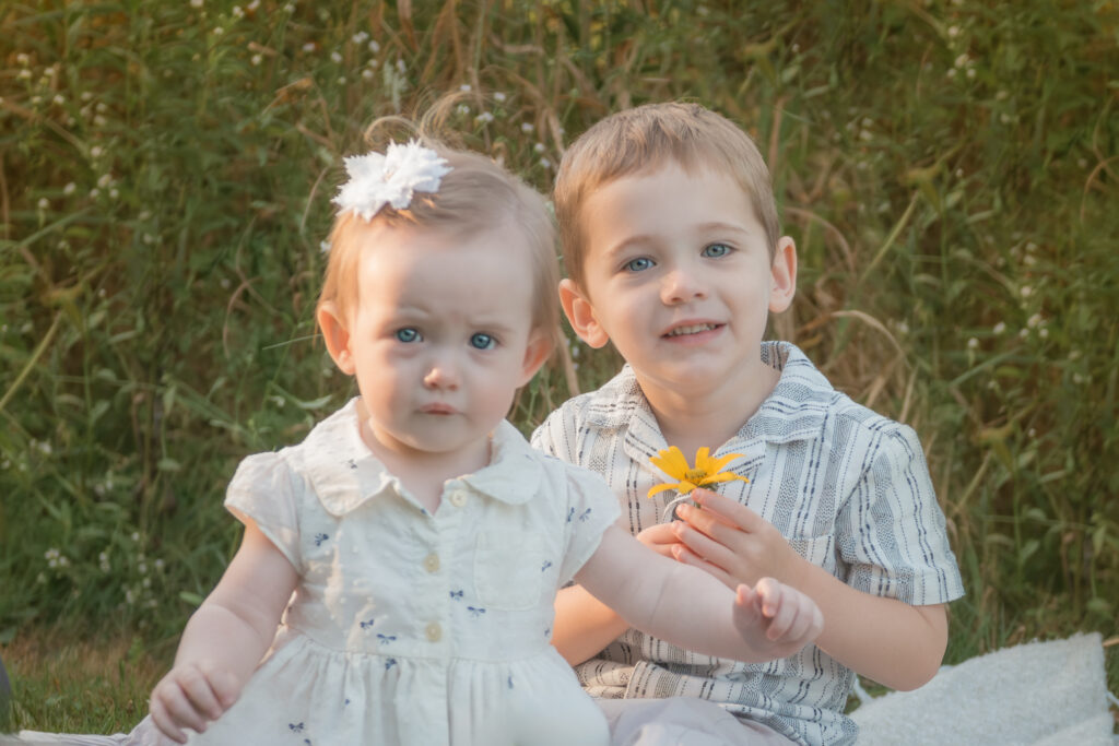 young girl and boy outdoors for family pictures